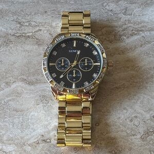 Working Geneva Gold Watch with Black Dial and Crystal Details